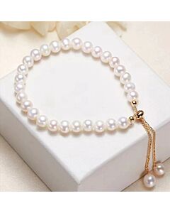Pure Radiance" Natural White Pearl Bracelet with Gold Accents